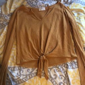 yellow long sleeve shirt